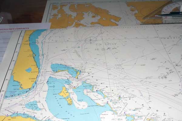 Paper charts are still used for navigation and record-keeping on Lone Ranger in addition to an array of sophisticated computers and electronic instruments. Notes about the ship’s position and important weather events, such as Tropical Storm Emily, are written directly on the chart in pencil.