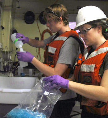 Abbey Chrystal, right, helps Joe Murray process water samples for his study of agricultural run-off into the Gulf of California waters.