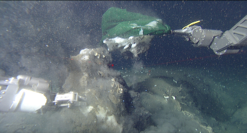 manipulator arm collecting hydrate sample