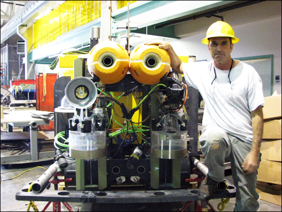 Mechanical Technician John Ferreira helped build the Benthic Rover, seen here in the MBARI Machine Shop.