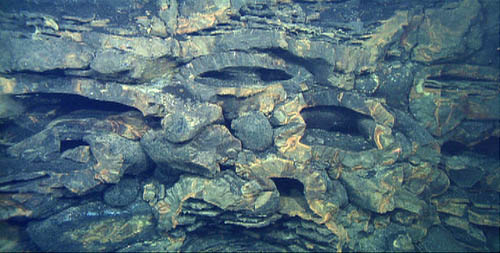 vertical face of the caldera wall
