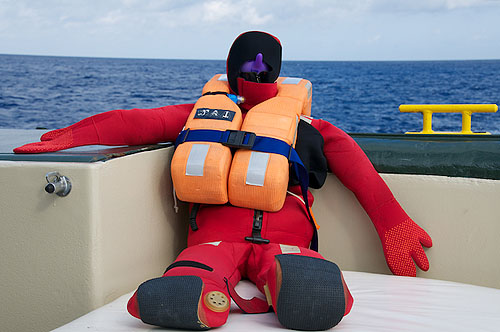 The captain uses transit time for crew training and drills. The crew practices rescue procedures during man overboard drills with this floatable figure.