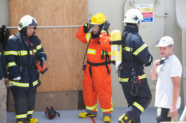Safety drills are an important part of preparing for sea voyages. Here the ship’s crew practices fighting a fire with specialized equipment. The science team also practices the process of responding to general alarm and evacuation bells. Life vest, long sleeve shirt, long pants, and a hat are required for all personnel in the event of an emergency.