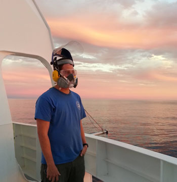 At 6:30 p.m. I had just enough time to watch the amazing sunset before the busiest part of our workday begins. One of the highlights of spending time at sea is watching the breathtaking sunsets, moonrises, sunrises, and the amazing star-filled sky. Acting Chief Mate Trevor Daviscourt took a break from boat maintenance to watch the sunset.