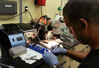 Bill working in the lab aboard the R/V Western Flyer.