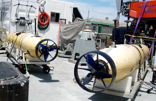 The Gulper AUV (left) and the mapping AUV (right) are secured aboard the Rachel Carson. This is the first time the Carson has had both AUVs and the ROV Ventana on the back deck.