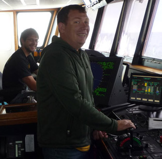 There are always two people on watch on the bridge. Captain Andrew McKee (at the controls in the forefront) and engineer Fred Peemoeller (in back).
