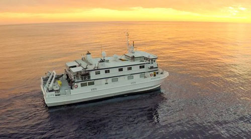 The Western Flyer at sunset in the Gulf of California, March 2015. This photo was taken by a drone flown by Andrew McKee and Ben Erwin.