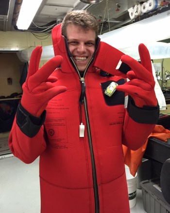 The safety training required to sail on the R/V Western Flyer includes learning how to don an immersion survival suit. Despite relatively warm water temperatures in the Gulf of California, being in the water for a long period of time could still lead to hypothermia. Florian Neuman is a Ph.D. student at Centro de Investigación Científica y de Educación Superior de Ensenada and Universidad Autónoma de Baja California.