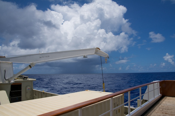 Isolated squalls form on the horizon during our transit.