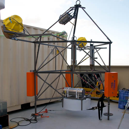 Time-lapse camera tripod being prepared for deployment.