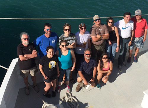 The team waits to disembark in La Paz. (back row, from left): Gernot Friederich, Erich Rienecker, Ryan Paerl, Jason Smith, Eric Fitzgerald, Monique Messié, Martín Hernández, Francisco Chavez. (front row, from left): Gabriela Chavez, Marguerite Blum, Tim Pennington, Karla Mejia.