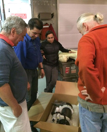 (left ro right) Francisco Chavez, Martin Hernandez, Karla Mejilla, and Gernot Friederich look at Martin’s “Sea pHOx”—an instrument that measures pH, oxygen, temperature, and salinity.