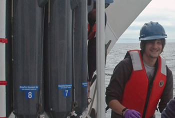 A.J. Limardo, a research assistant in Alex Worden’s Molecular Microbial Ecology lab, collects water samples from the CTD. A.J. is filtering the water to extract DNA from Bathycoccus—a type of phytoplankton.