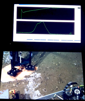 This image was taken from the main science chair in the control room. On the bottom, we have a high-definition video monitor. On top, we display the laser Raman spectra so that everyone in the control room can see. The location of the peaks in the Raman spectra indicate which chemicals are present in the pore water.