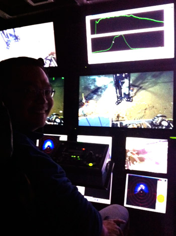 Xin at the main science camera controls as the Raman system acquires a spectra.