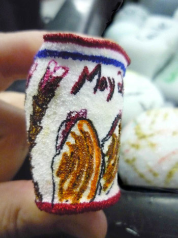 Attached to the ROV, this Styrofoam cup, decorated with seep clams, was shrunk down to its small size due to the enormous pressure of the ocean at 1,800 meters (5,900 feet).