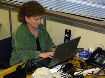 Your scribe, Nancy Barr, preparing the day’s cruise log in the ship’s lab.
