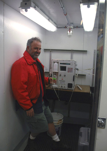Tim Pennington at the instrument for running salinity tests, which are usually performed by Curt Collins.