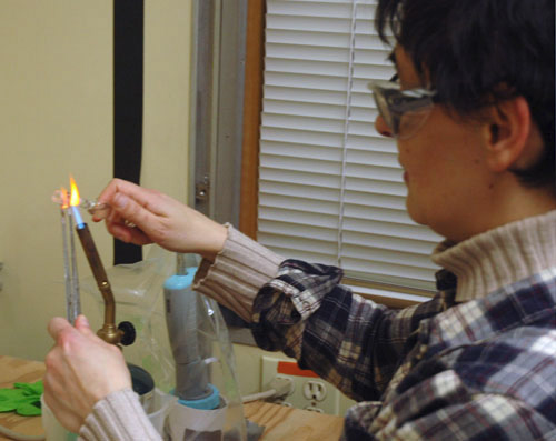 Carmen Castro seals her seawater samples in glass ampules. She’ll take them back to her lab in Spain to analyze them for their organic carbon content.