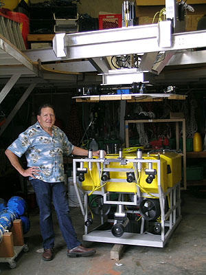 Engineer Farley Shane with model of ROV Doc Ricketts