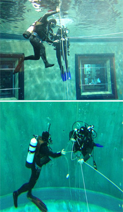 Steve Haddock and Stephan Siebert practice setting up and attaching to the line for blue-water diving in MBARI’s test tank. Danielle Haddock took these photos through the windows of the conference room adjacent to the test tank during the check-out dive.