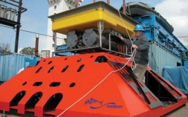This massive orange-painted steel frame protects the node's electrical equipment from damage by fishing nets and anchors. The frame was installed during the cable-laying process. Later, the main node, with its yellow floatation pack, was lowered into the frame by ROV Ventana. In this photo, you can see the the two pressure cylinders that contain electrical equipment for handling power and data. Photo courtesy of L-3 MariPro.
