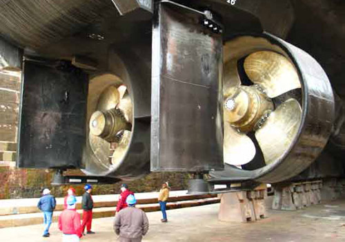 This photo, taken while the RVIB Palmer was in dry dock, shows the ship's massive propellers and rudders, which are protected from backing into ice by an ice knife above. Photo by Mike Watson.