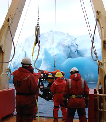 ROV IceCUBE dives near a small iceberg. Photo by Cole Hexel.