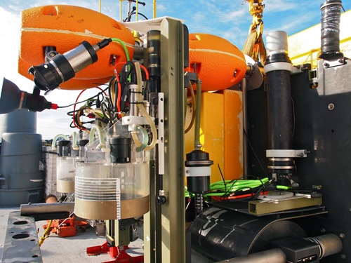 The chambers pictured here are lowered into the sediment and used to measure sediment community oxygen consumption. Photo: Carola Buchner.