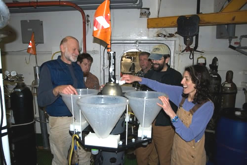LST team celebrates the first deployment of the instrument under an iceberg. Photo by Debbie Nail Meyer.