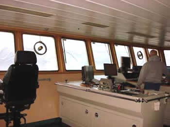Third mate Brandon Bell holds the ship steady for hours during an ROV deployment. Photo by Amanda Kahn.