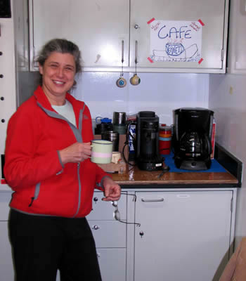 Maria Vernet gets a cup of coffee at