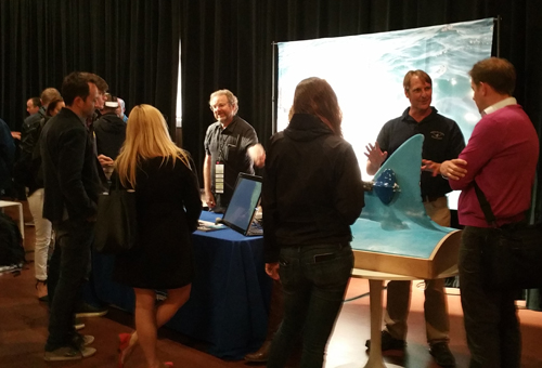 Thom Maughan, second from right, recently displayed the shark fin at a booth at the EG10 conference at the Sunset Center in Carmel, CA.