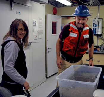 Kris Walz and Rob Sherlock sort through the night's trawl.