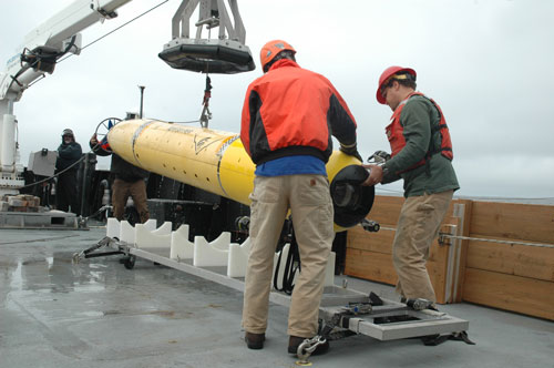 MBARI engineers return the i2MAP AUV to its cradle after a midwater survey. Photo: Kim Fulton-Bennett © 2016 MBARI