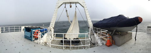 Panorama of the back deck. The trawl net hangs to dry on the A-frame. You can’t tell from the image, but the wind came up to over 28 knots this afternoon.