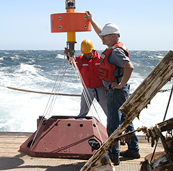 Researchers from the Naval Postgraduate School prepare to lower a current meter onto the seafloor off Monterey Bay as part of the ASAP experiment. Image: (c) 2006 Naval Postgraduate School