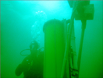 MBARI engineer Gene Massion deploys the first-generation Environmental Sample Processor off the coast of Maine. Image credit: Mark Greise (c) 2001 MBARI