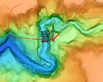 This map shows the location of the mapping AUV missions. The red line shows the track of the first autonomous survey. The black lines show the “lawnmower” tracks followed by an earlier, ROV-mounted survey. Image: David Caress (c) 2005 MBARI