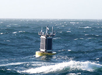 The new surface buoy rides the rough waters of the open ocean at the Shepard Meander Observatory, 100 kilometers from shore. Image: Kent Headley (c) 2006 MBARI