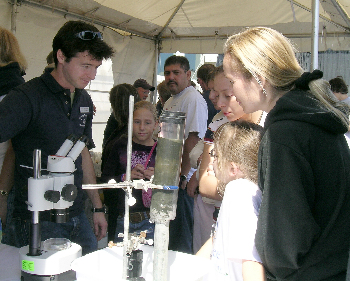 MBARI is a great place to learn about some of the interesting things that live in deep-sea mud. Here, biologist Christian Levesque explains his benthic biology work to visitors. Photo: Debbie Meyer (c) 2004 MBARI