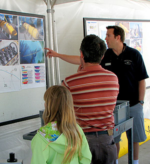 AUV Specialist Doug Conlin explains how an autonomous underwater vehicle (AUV) can find its way around Monterey Bay without without direct control from the surface. Photo: Duane Thompson (c) 2007 MBARI