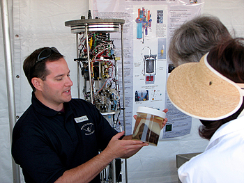 Marine biologist Mike Vardaro talks about how animals such as this sea urchin can survive on tiny particles of food that drift down to the deep seafloor. Photo: Duane Thompson (c) 2007 MBARI