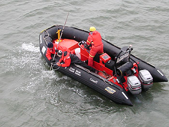 Researchers tried several methods for collecting methane gas that bubbles up from pingo-like features into the frigid waters of the Arctic Ocean. Image: (c) 2003 Charlie Paull