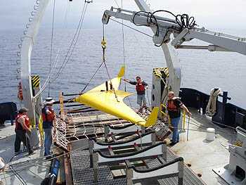 The XRay glider, a newly designed, high-performance undersea robotic vehicle from Scripps Institution of Oceanography and the University of Washington, is readied for a trial run as part of the PLUSNet experiment. Image: (c) 2006 University of Washington