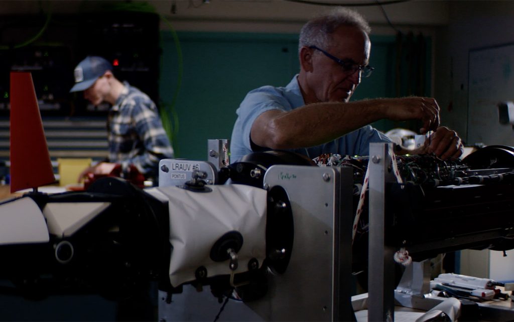 Engineers work in MBARI's LRAUV lab