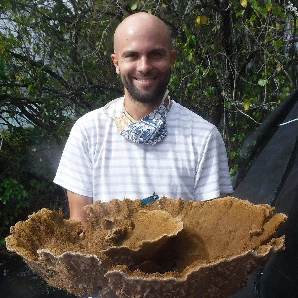 Chris Suchocki with a large coral